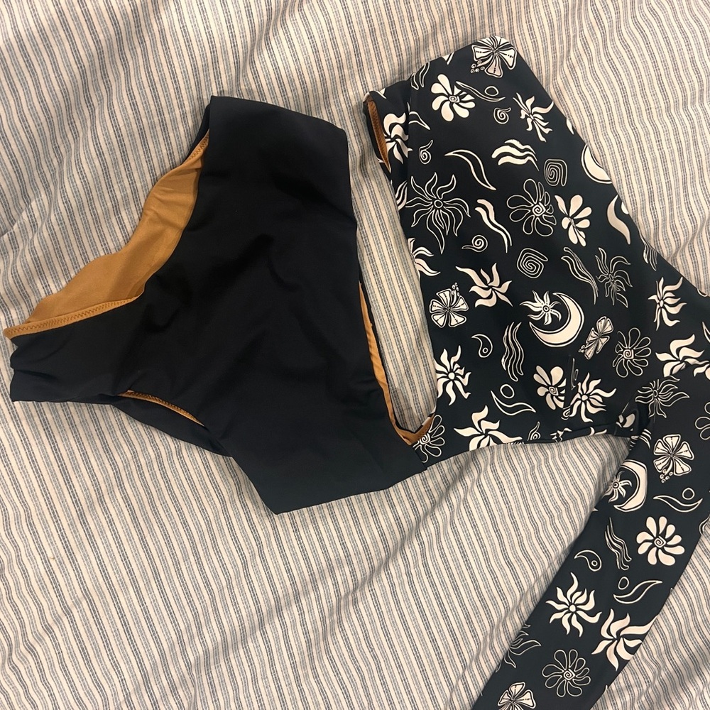 Rip Curl Tan and Black Apparel